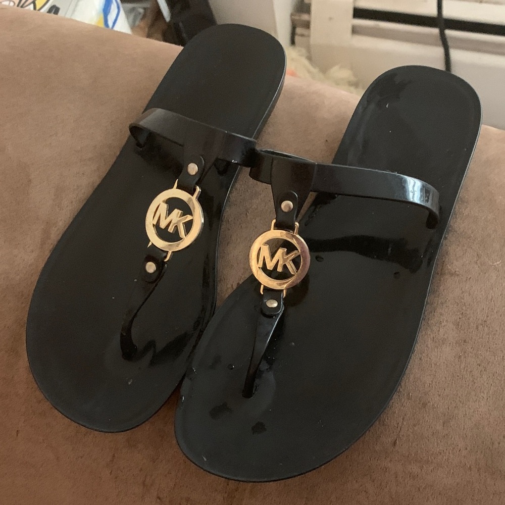 Michael Kors Glossy Black Sandals with Gold Emblem